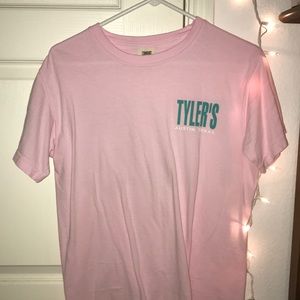 Pink Tyler’s shirt